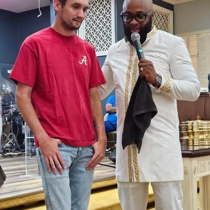 A new member being welcomed at Greater Fellowship