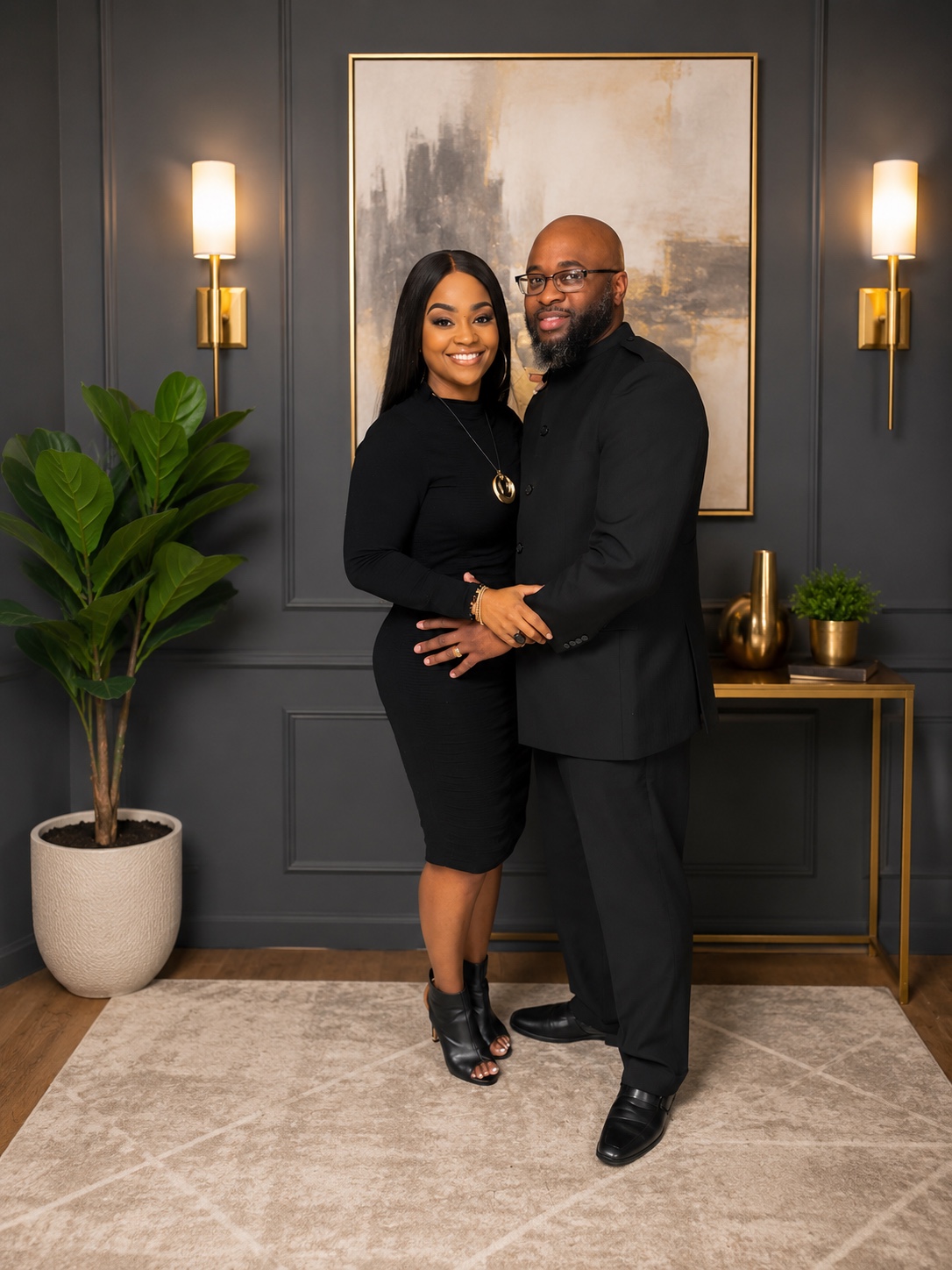 Pastor Dowand Malone and Lady Rita Malone dressed in black
