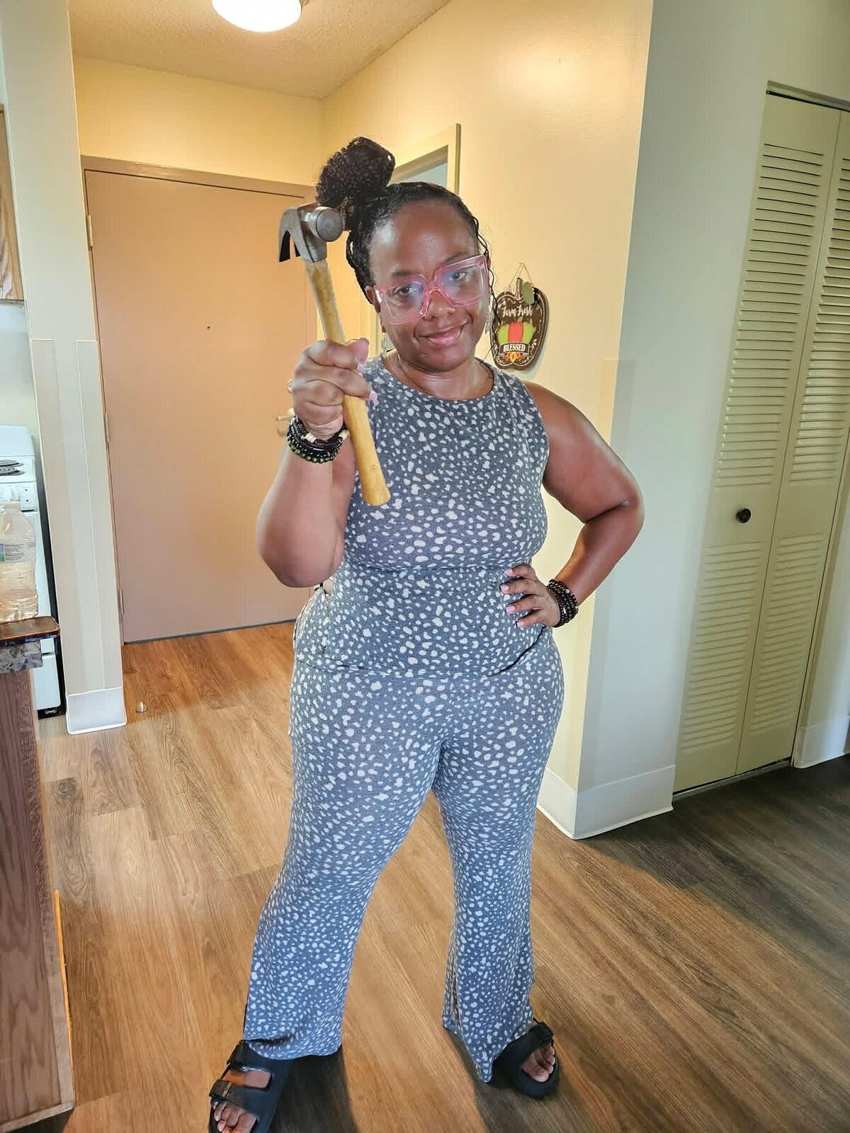 A Women’s Ministry volunteer ready to help with a home project