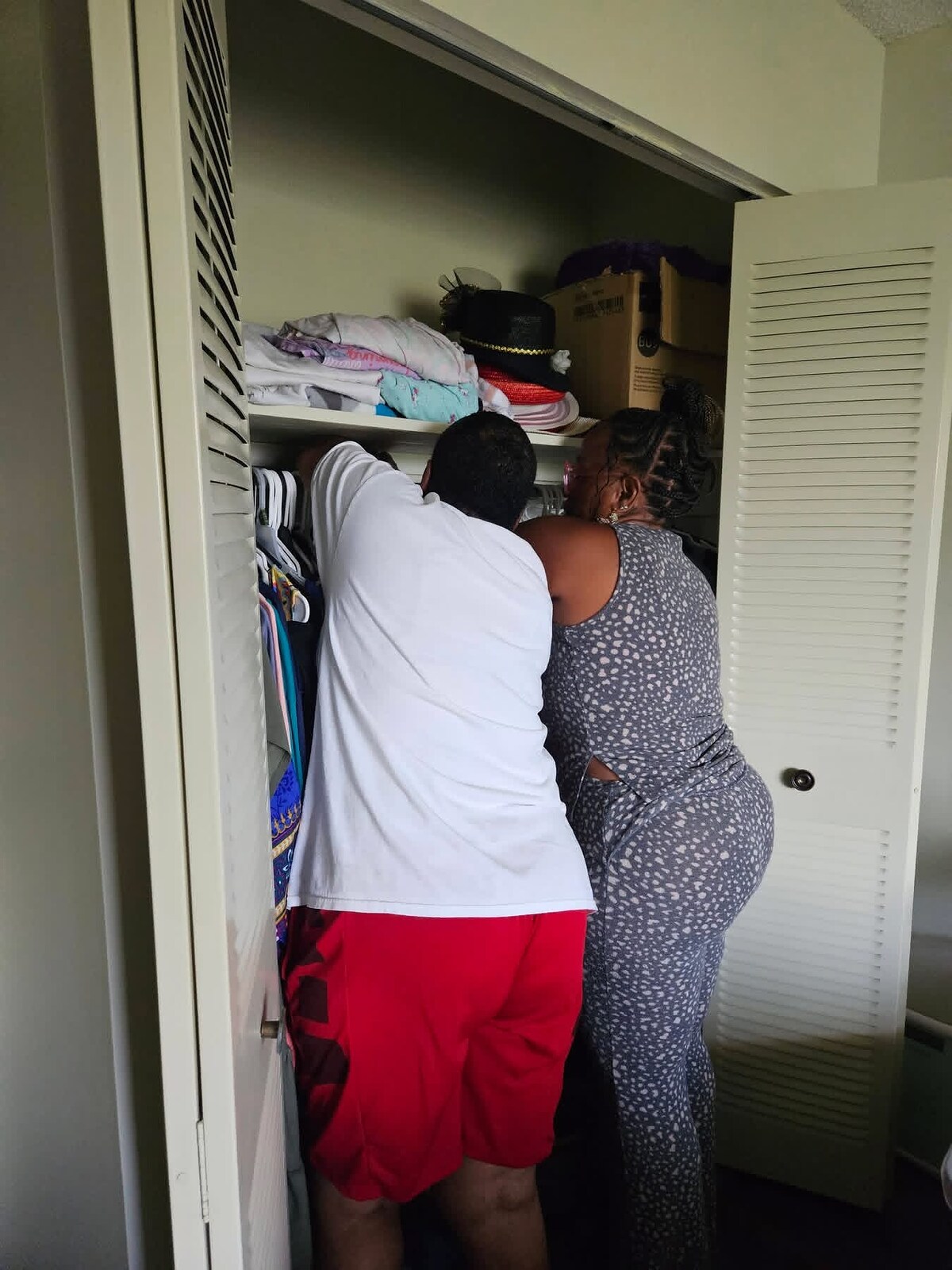 Women’s Ministry volunteers arranging a community clothing closet
